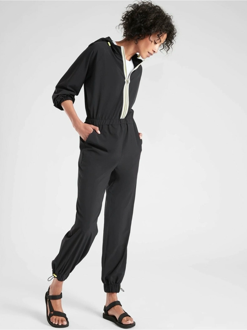 Athleta NWT Dipsea Hooded Zip front Romper. Black. Brand new with tags. Size 4.